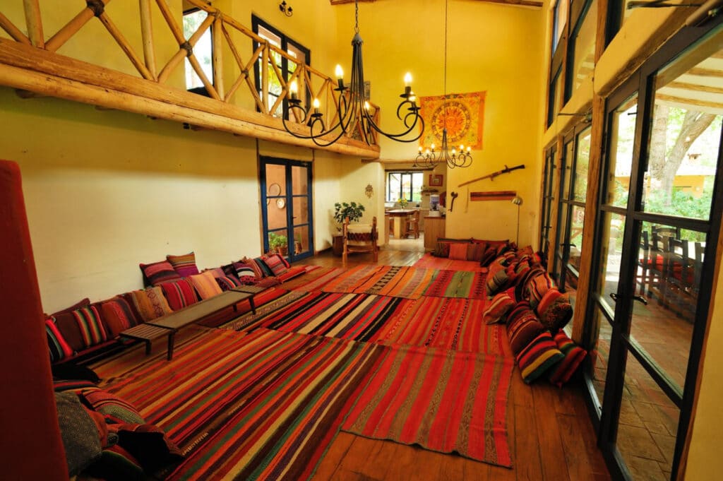 Shala Sol with floor cushions and woven rugs at Melissa Wasi in Pisac