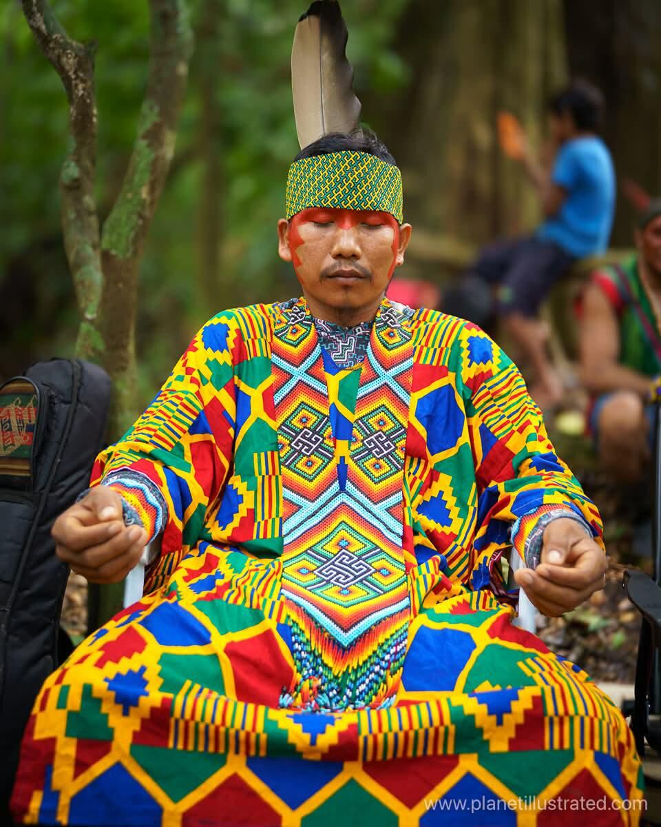 A Huni Kuin guide in a woven robe and headband